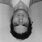 Liber-May-passport-photo-1998--size505x505px-copy-upsidedown-greyscale